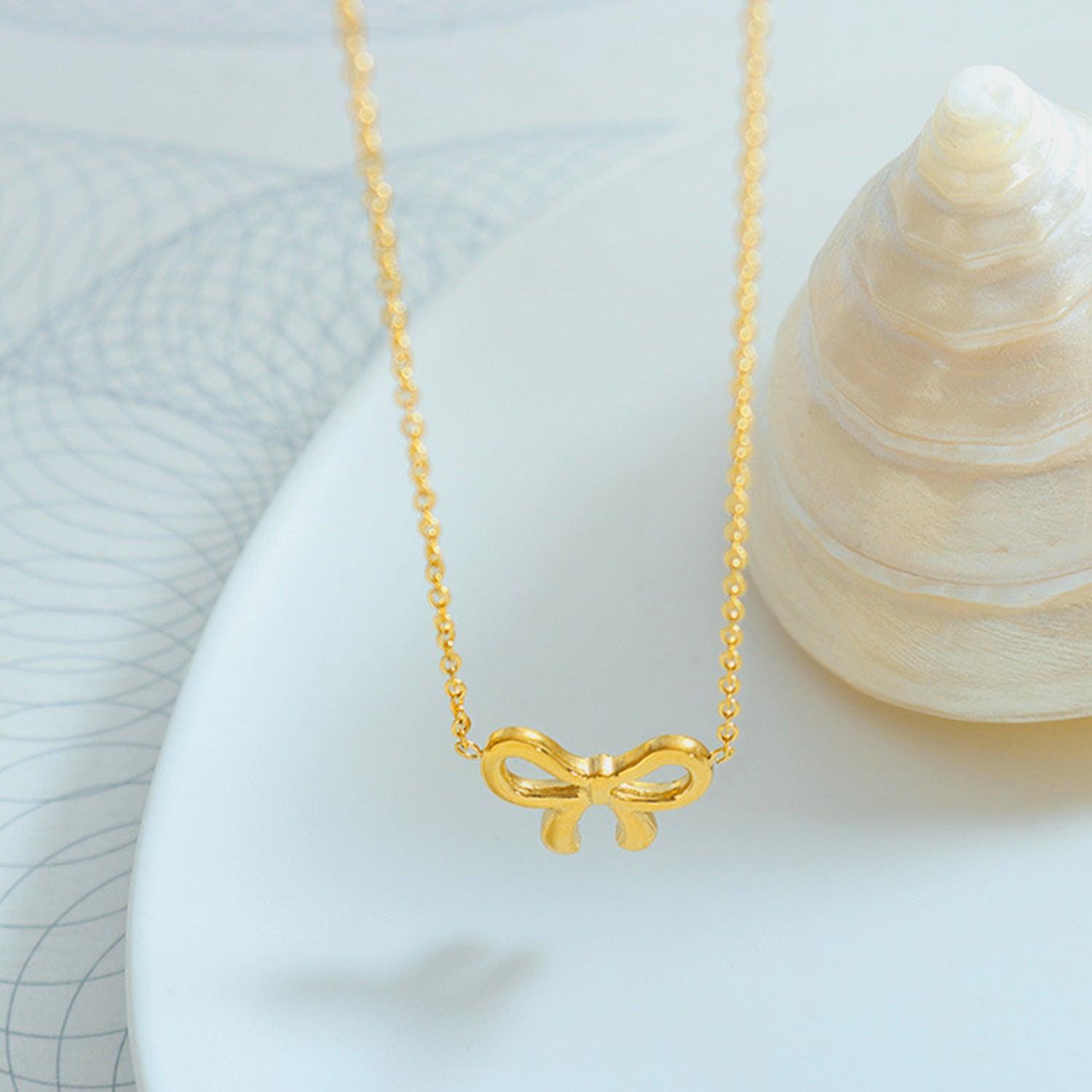 Gold-Plated Titanium Steel Bow Pendant Necklace Carauana Store