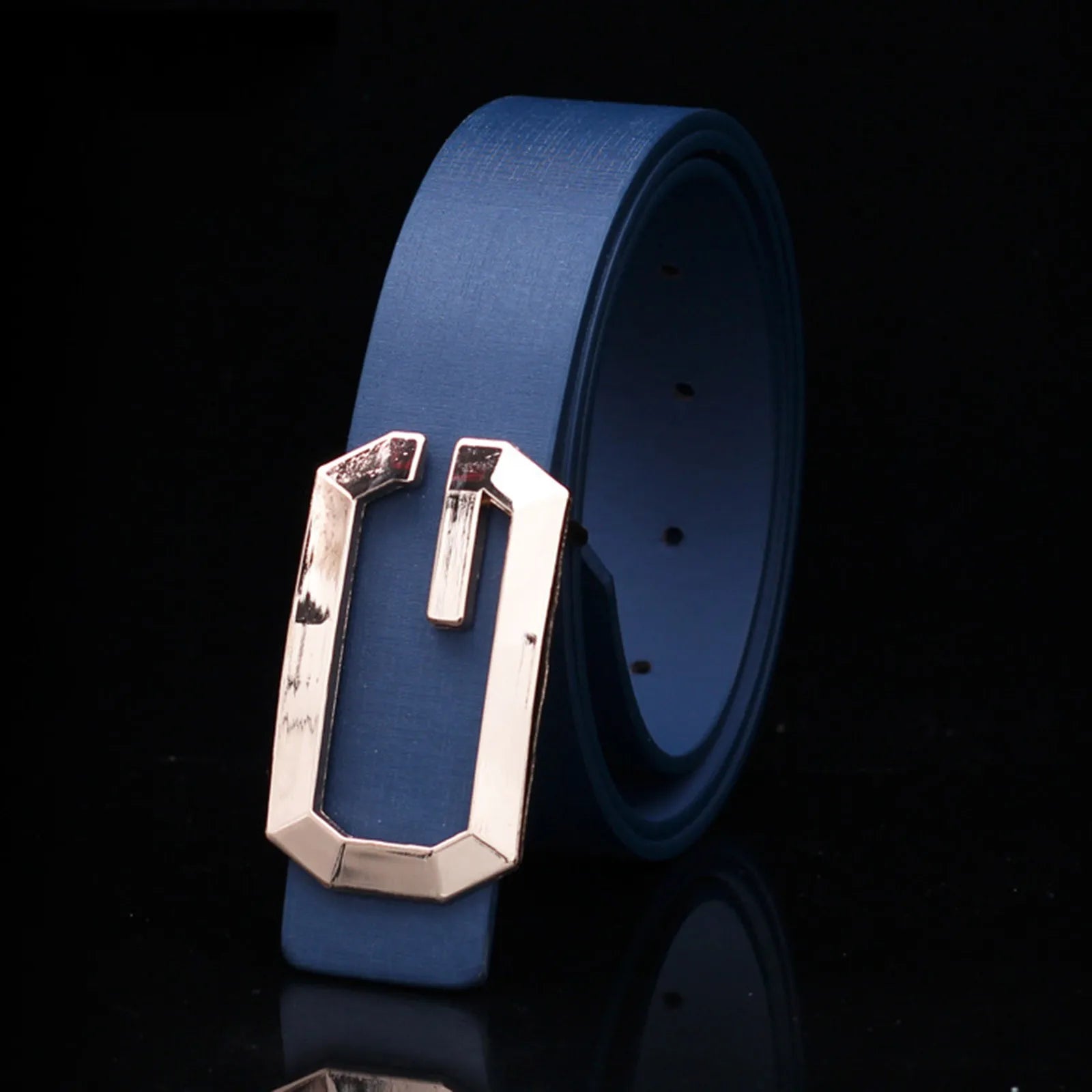 Blue belt with a gold buckle on a black background