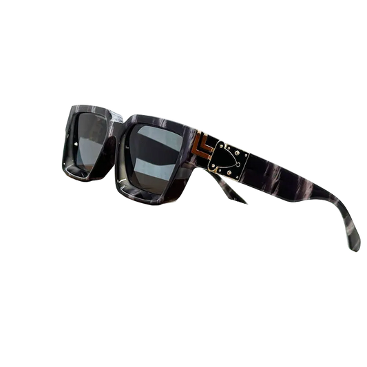 Carauana Millionaire GO with decorative arm on a cardboard box