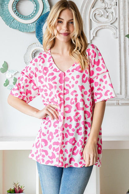 Heimish Full Size Leopard Exposed Seam Short Sleeve Top Carauana Store
