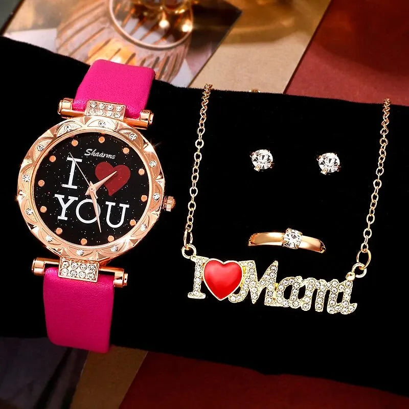 Jewelry set with pink watch, 'I ❤️ You' necklace, and 'I ❤️ Mámi' ring on a black background.