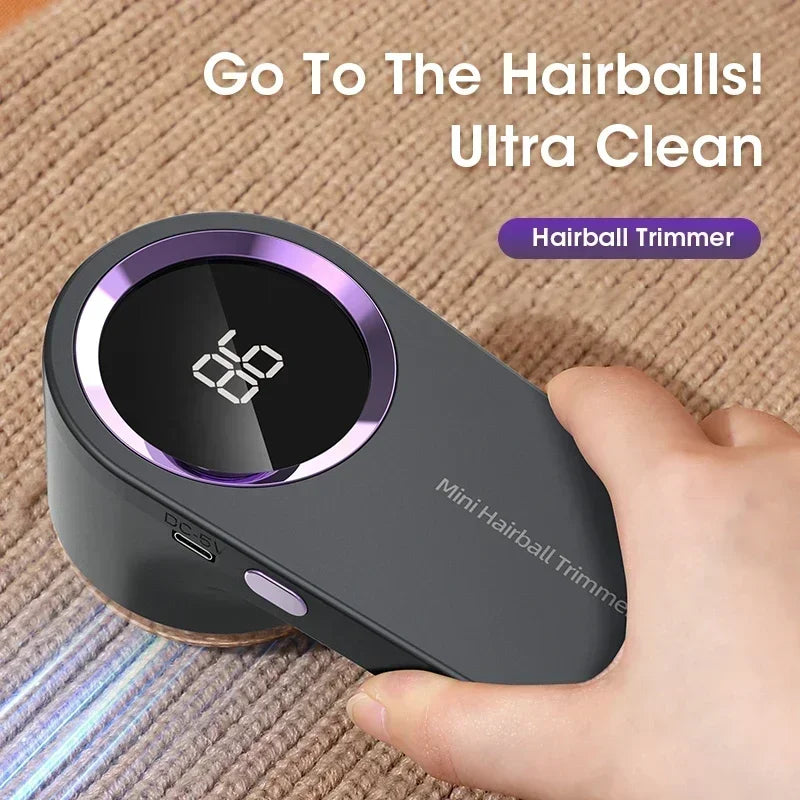 Hairball trimmer with digital display held by a hand