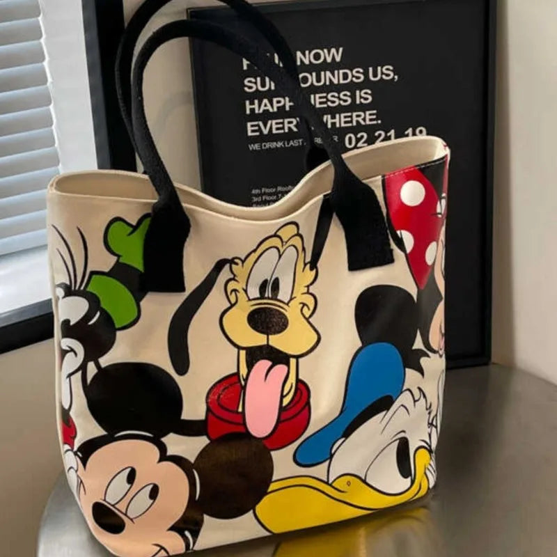 Tote bag with cartoon character design on a surface