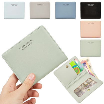 Light green wallet held by a hand with multiple color options displayed above.