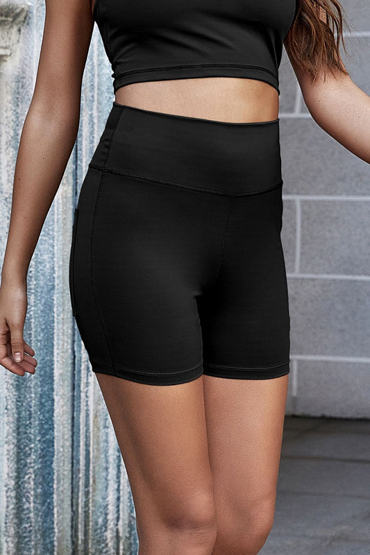 Exposed Seam Decorative Button Yoga Shorts Carauana Store